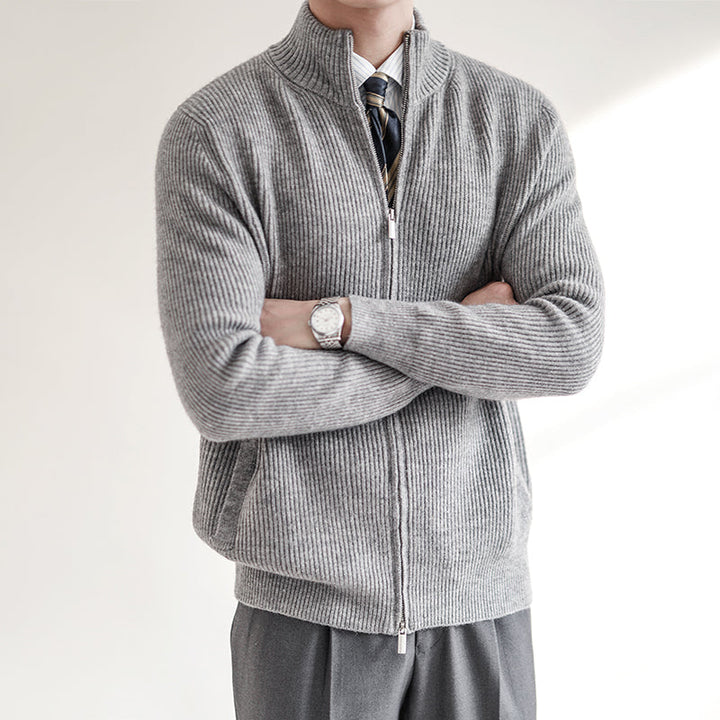 Man in a modern men's premium ribbed zip-front cardigan sweater, showcasing its comfortable slim fit.