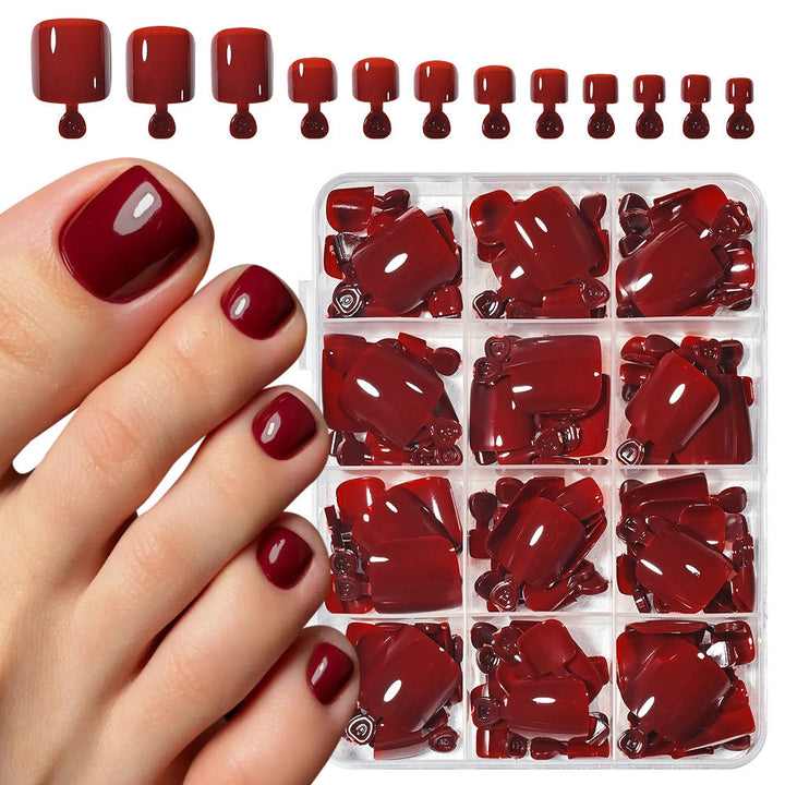 Men's press-on toenail kit with red fake nails for easy DIY pedicures & stylish grooming. Adhesive & reusable.