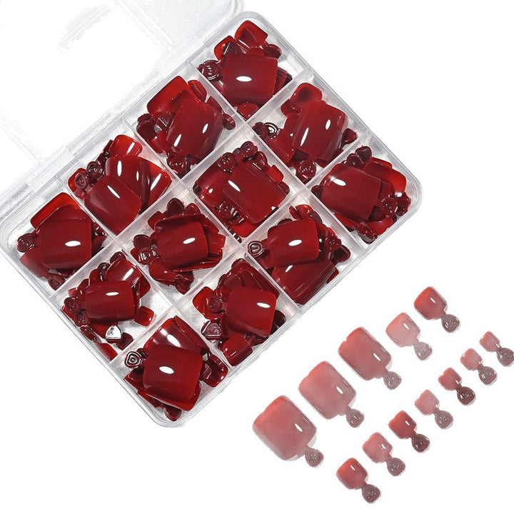Complete men's press-on toenail kit with red fake nails for convenient, stylish, and easy at-home pedicures.