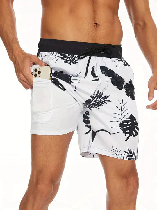 Vibrant men's printed drawstring swim shorts, ideal for summer beach & pool.