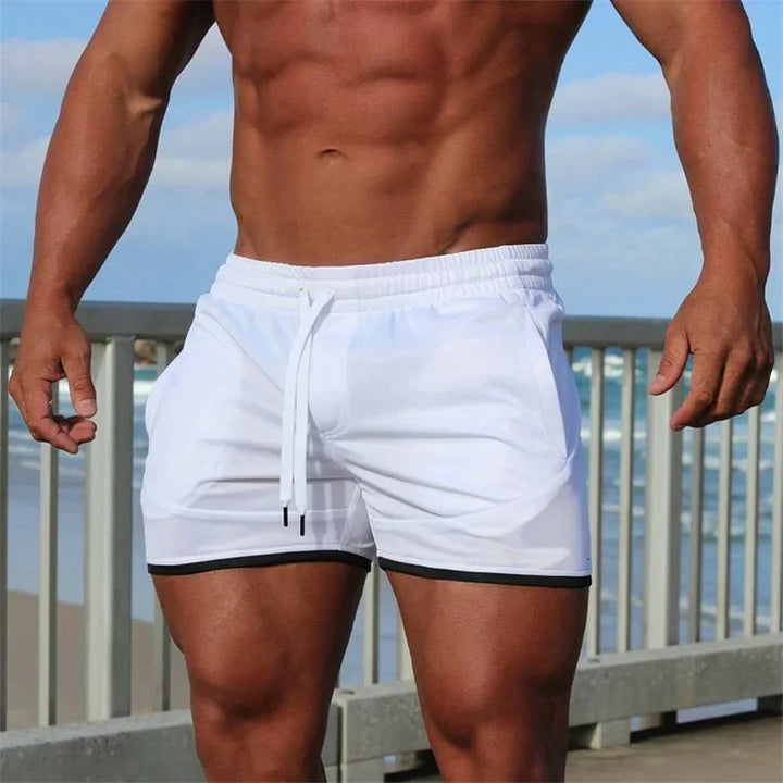 Comfortable men's quick-dry swim shorts with athletic fit & mesh lining. Perfect for summer water sports.
