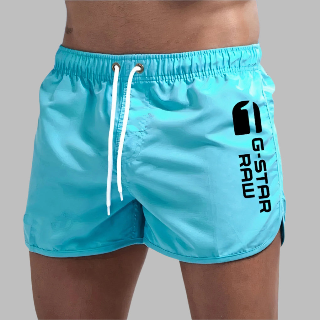 Men's quick-dry athletic swim trunks, perfect for beach, pool, and summer sports activities.
