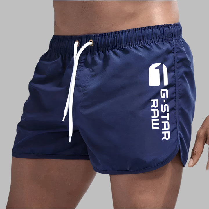 Performance men's quick-dry athletic swim trunks for beach, pool, and active summer swimwear.