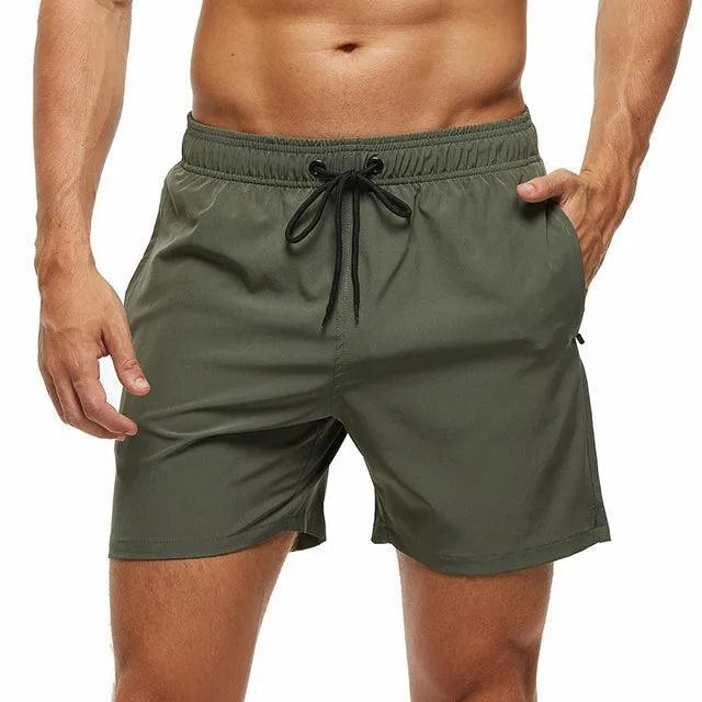 Comfortable men's quick-dry drawstring swim shorts for beach, pool, and casual summer fashion.