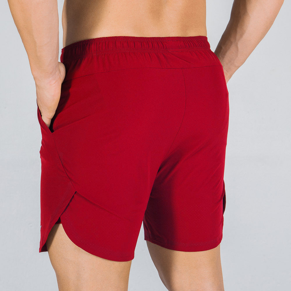 Performance men's activewear shorts, quick-dry fabric, flexible for intense gym workouts and sports.