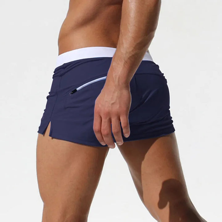 Stylish men's quick-dry swim trunks, perfect for beachwear, pool days, or summer active shorts.