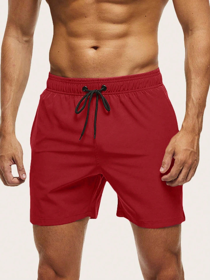 Men's quick-dry stretch swim shorts for beach & pool, lightweight & comfortable.