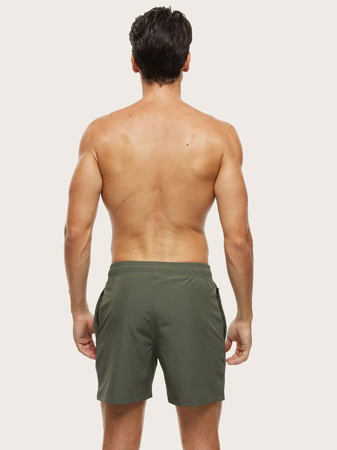 Quick-dry & stretch men's swim trunks, essential lightweight beachwear for summer holidays.