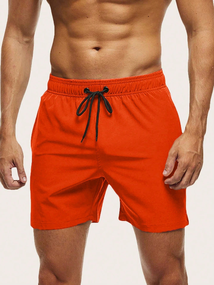 Men's activewear swim shorts, quick-dry stretch fabric for beach sports & pool.
