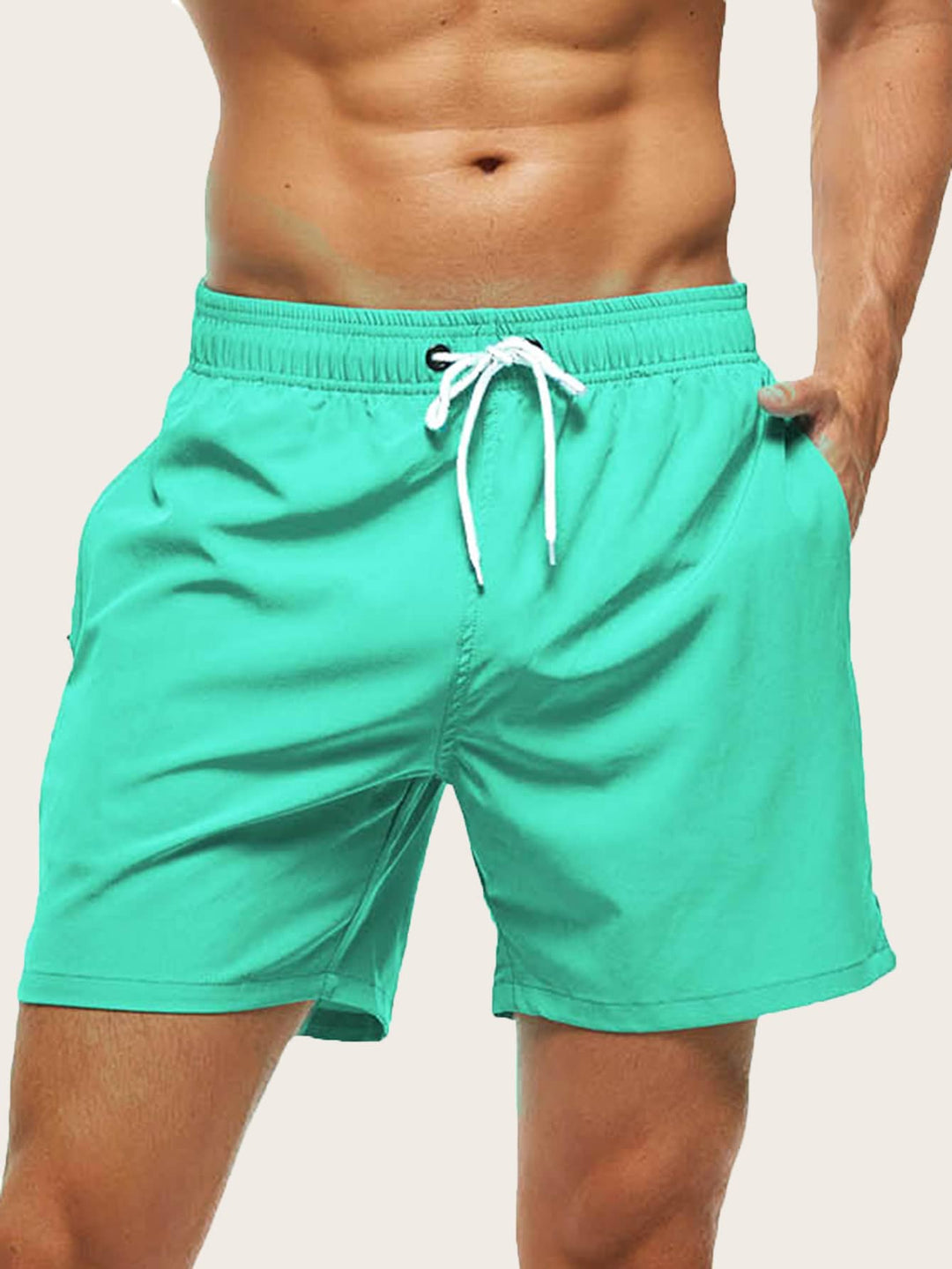 Easy-care quick-dry men's swim shorts, lightweight stretch design for beach & pool.