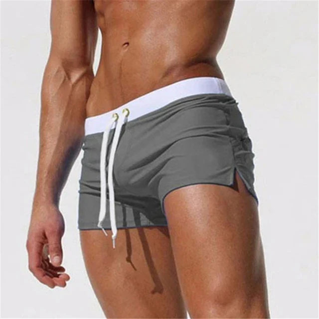 Comfortable men's quick-dry swim shorts, versatile for beach, pool, and casual summer outings.
