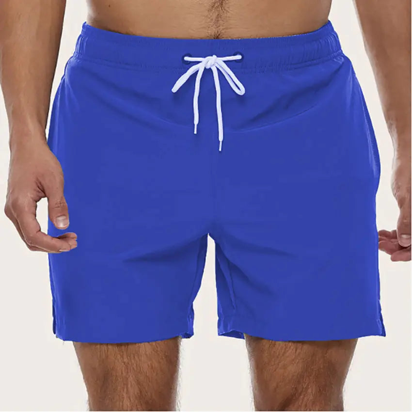 Men's quick-dry beach shorts with a comfortable elastic waist, great for summer pool days.