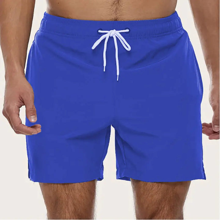 Men's quick-dry beach shorts with a comfortable elastic waist, great for summer pool days.