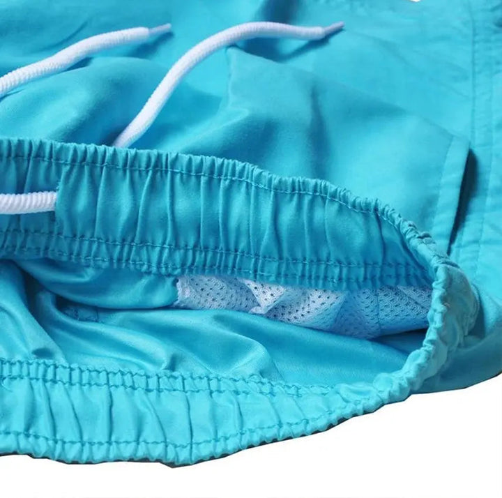 Durable men's quick-dry swim trunks, perfect for any beach or pool activity this summer season.