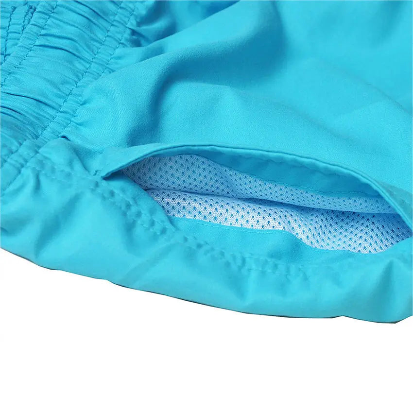 Active men's quick-dry swim trunks for swimming & beach sports. Comfortable elastic waist design.