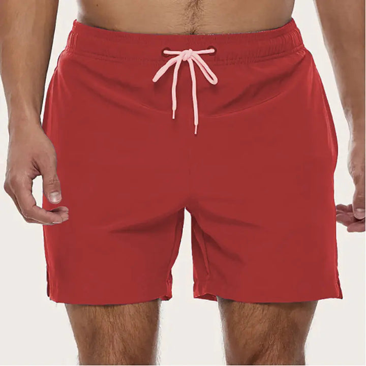 Vibrant men's quick-dry swim trunks for beach & pool, offering comfort & style for vacation.