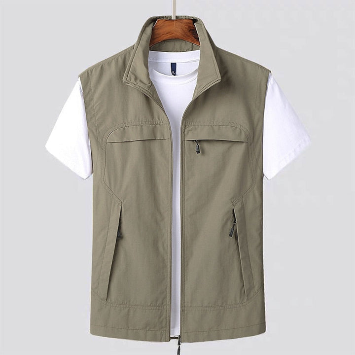 Lightweight men's quick-dry performance vest. Perfect breathable activewear for summer, travel, & everyday casual comfort.