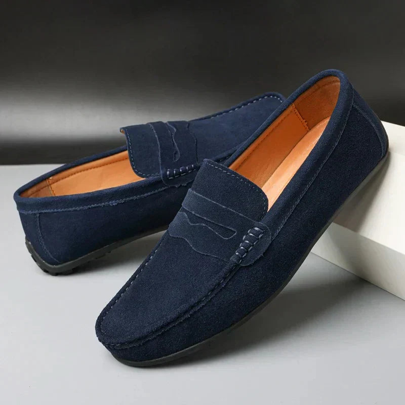 Men's refined brown leather penny loafers, perfect for smart-casual wear & effortless style.