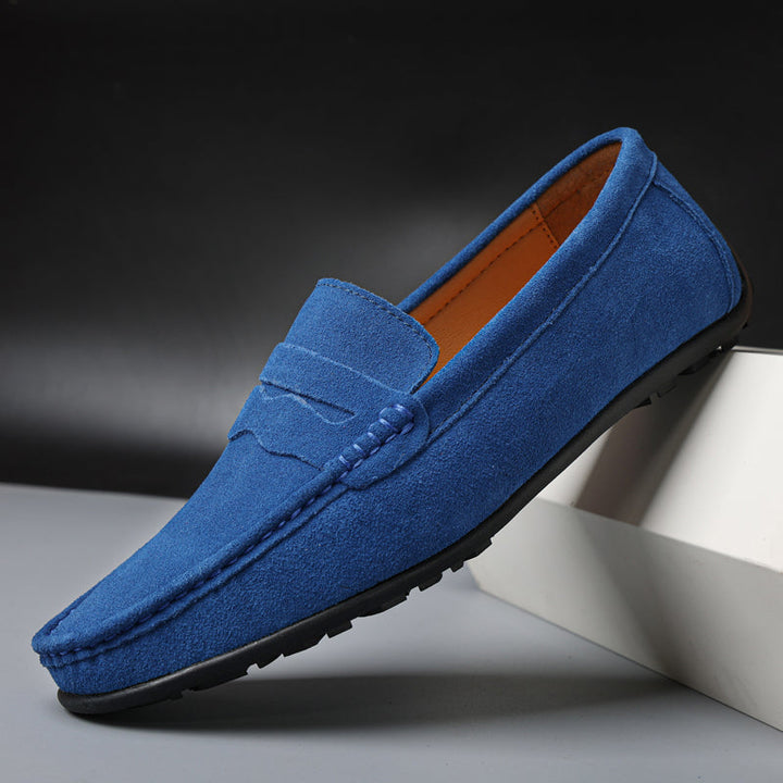 Sleek leather men's penny loafers, durable & stylish slip-on shoes for any casual occasion.