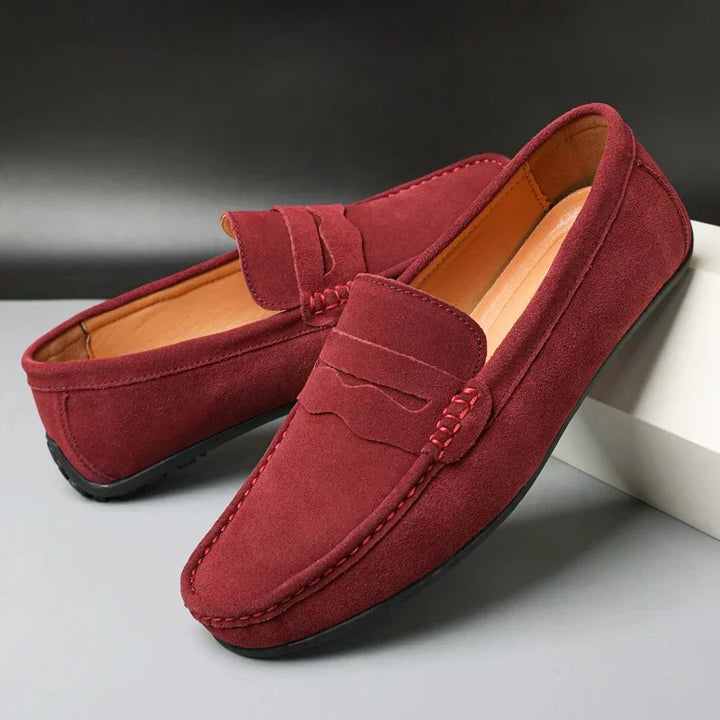 Classic men's slip-on penny loafers in versatile leather, offering comfort & refined casual style.
