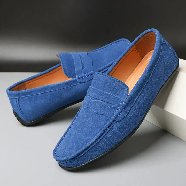 Versatile men's penny loafers, ideal for both casual & smart-casual outfits, comfortable slip-on design.