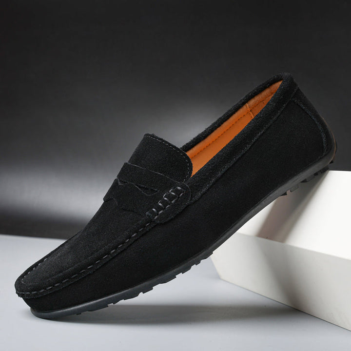 Refined men's penny loafers, classic slip-on shoes for a sophisticated yet casual fashion statement.