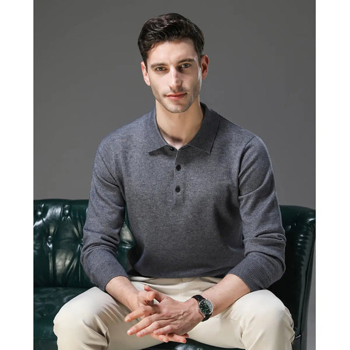 Modern men's button polo knit jumper. Luxurious long sleeve cashmere for smart casual fashion.