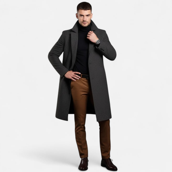 Slim-fit men's mid-length trench coat, exuding refined Oxford style. Sophisticated outerwear for modern fashion.