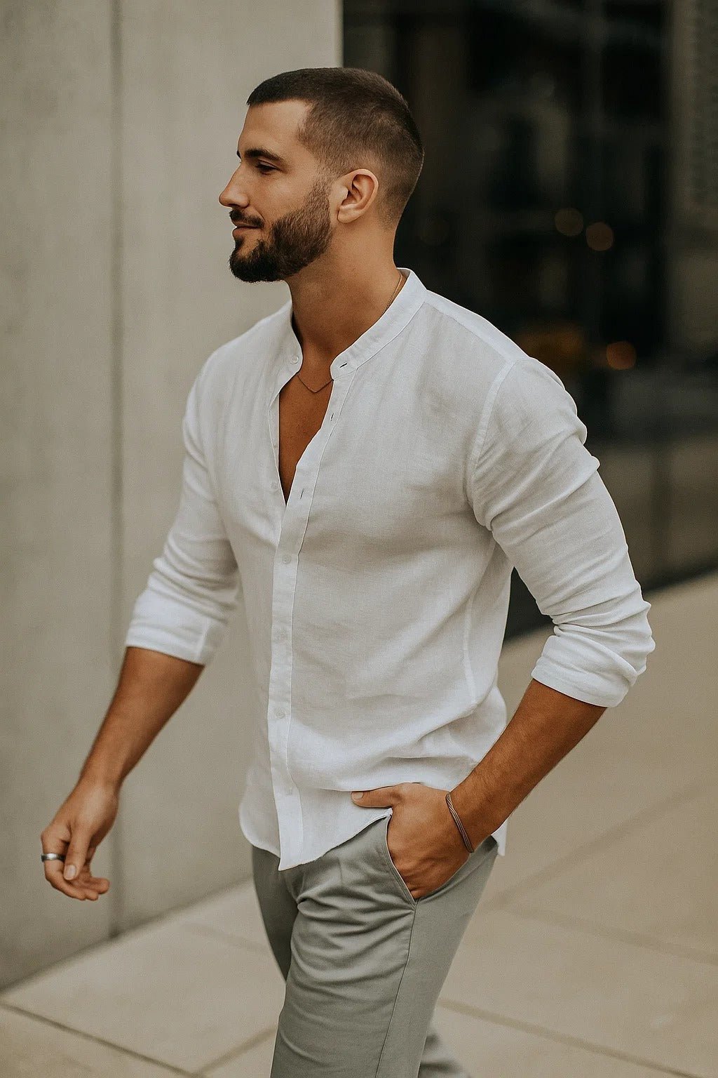 Breathable men's linen shirt with a grandad collar & long sleeves. Ideal for comfortable smart casual summer wear.