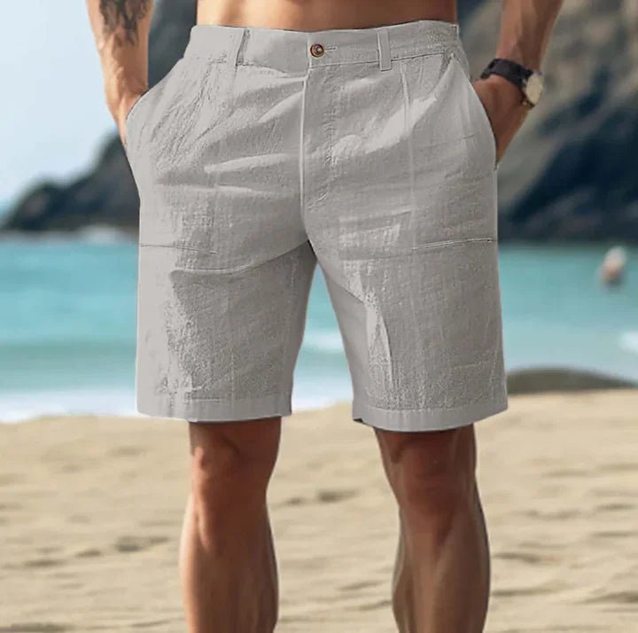 Front view of men's button-front linen summer shorts with functional pockets. Regular fit for everyday casual style.
