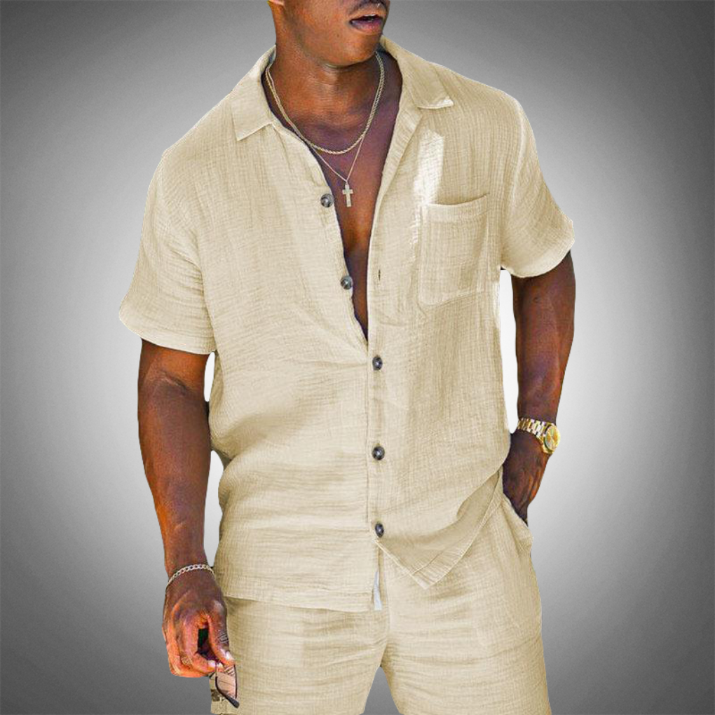 Stylish white men's relaxed fit shirt and trouser set, ideal for versatile day-to-evening summer outfits.