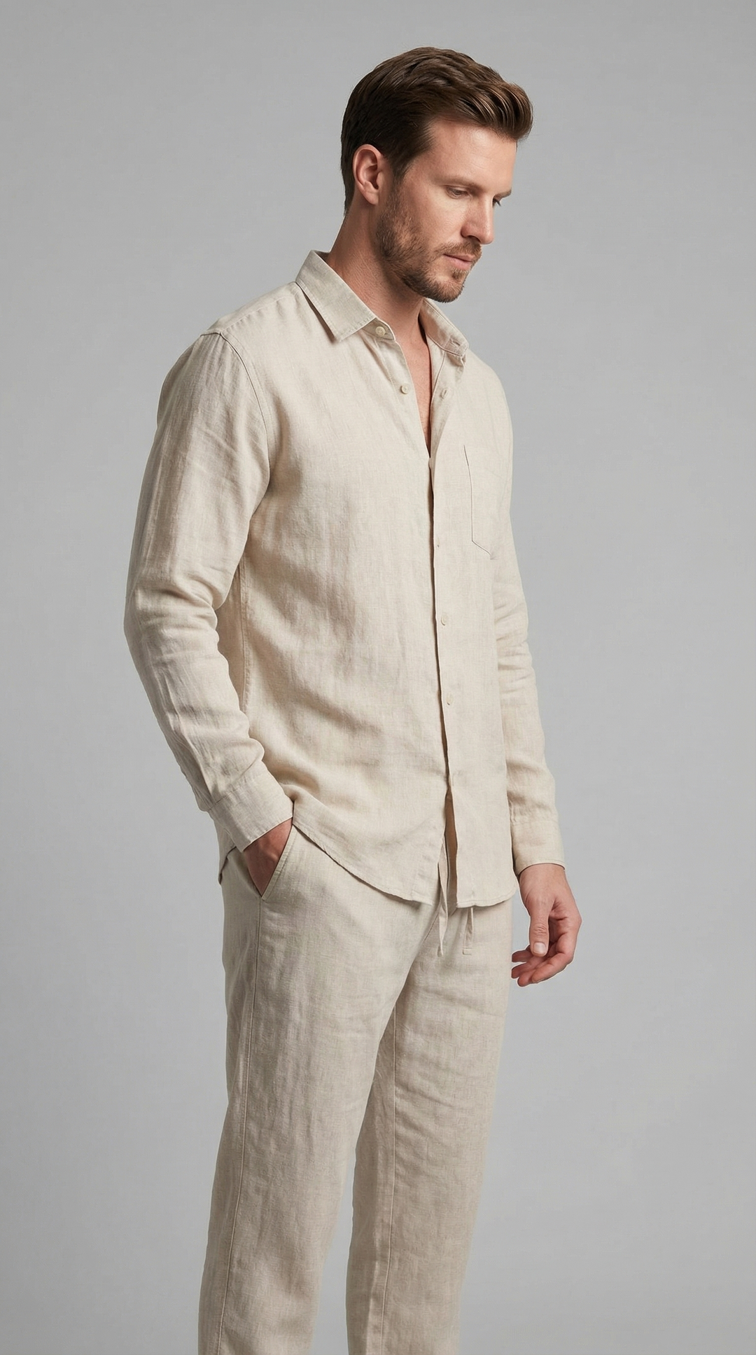 Stylish men's two-piece outfit: relaxed fit shirt & trousers, perfect for summer resort fashion.
