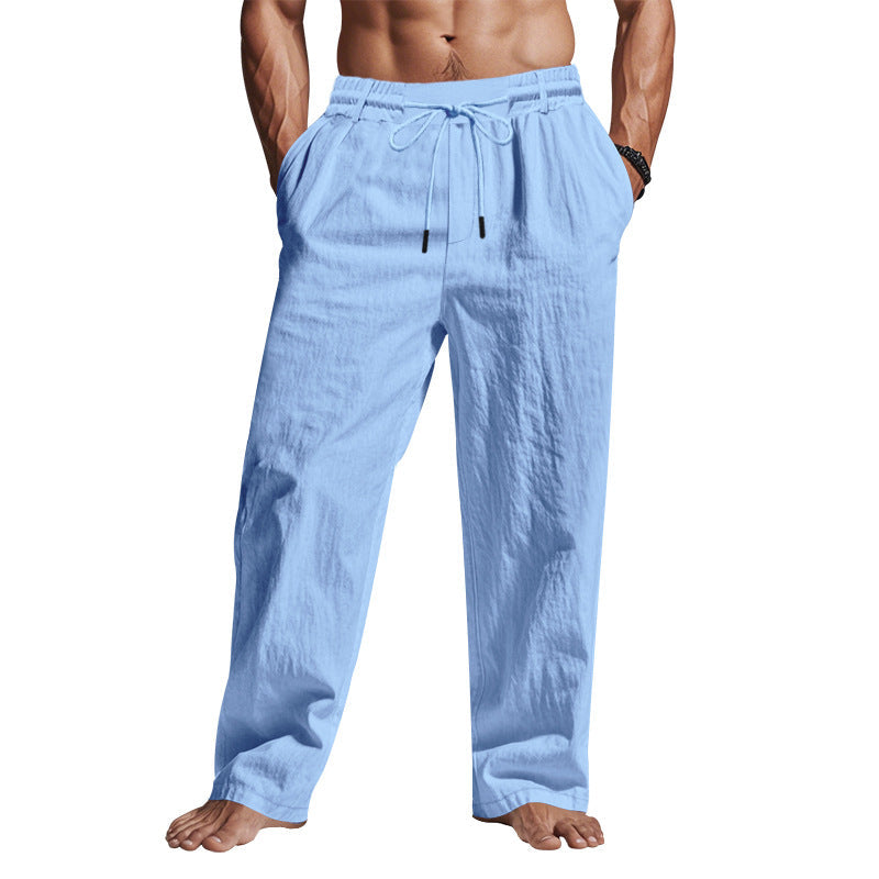 Versatile men's relaxed fit drawstring trousers, breathable & full length, great for smart casual or travel.