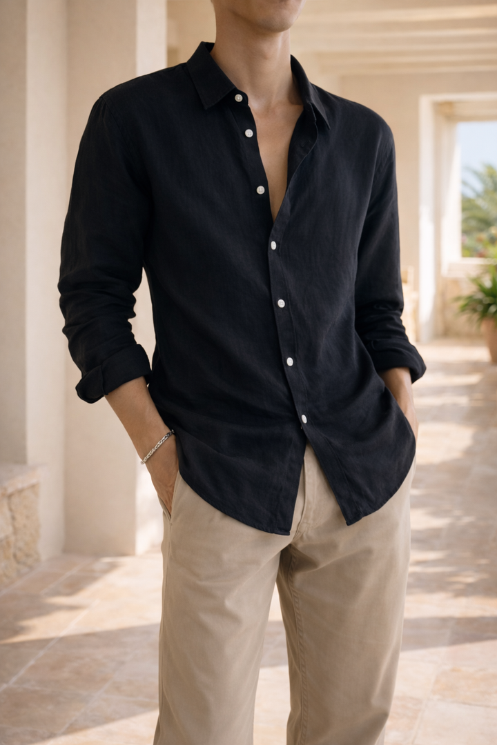 Stylish men's collared button-down shirt, relaxed fit, long sleeve, ideal for smart casual comfort.