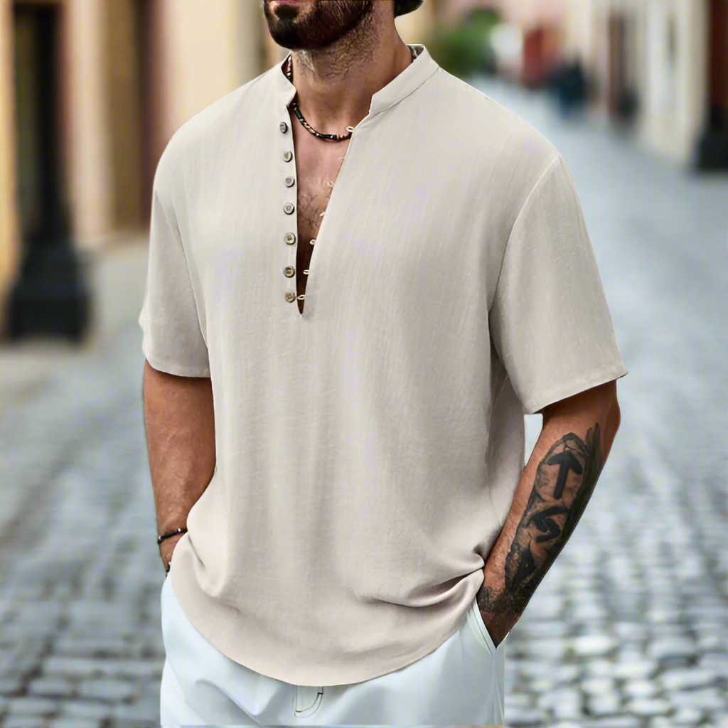 Men's relaxed fit button neck short sleeve summer top in a versatile color, perfect for casual, breathable warm weather style.