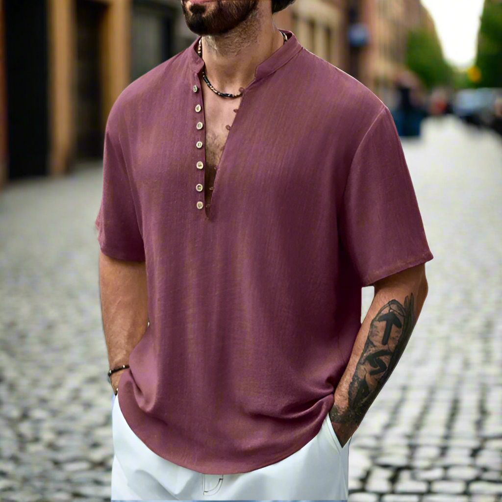 Stylish men's button neck short sleeve top. Relaxed fit for breathable comfort, ideal casual wear during warm summer days.
