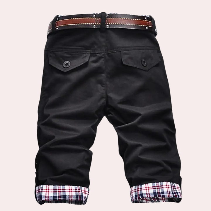 Casual men's relaxed fit cargo shorts with multiple utility pockets, perfect for everyday streetwear & comfort.