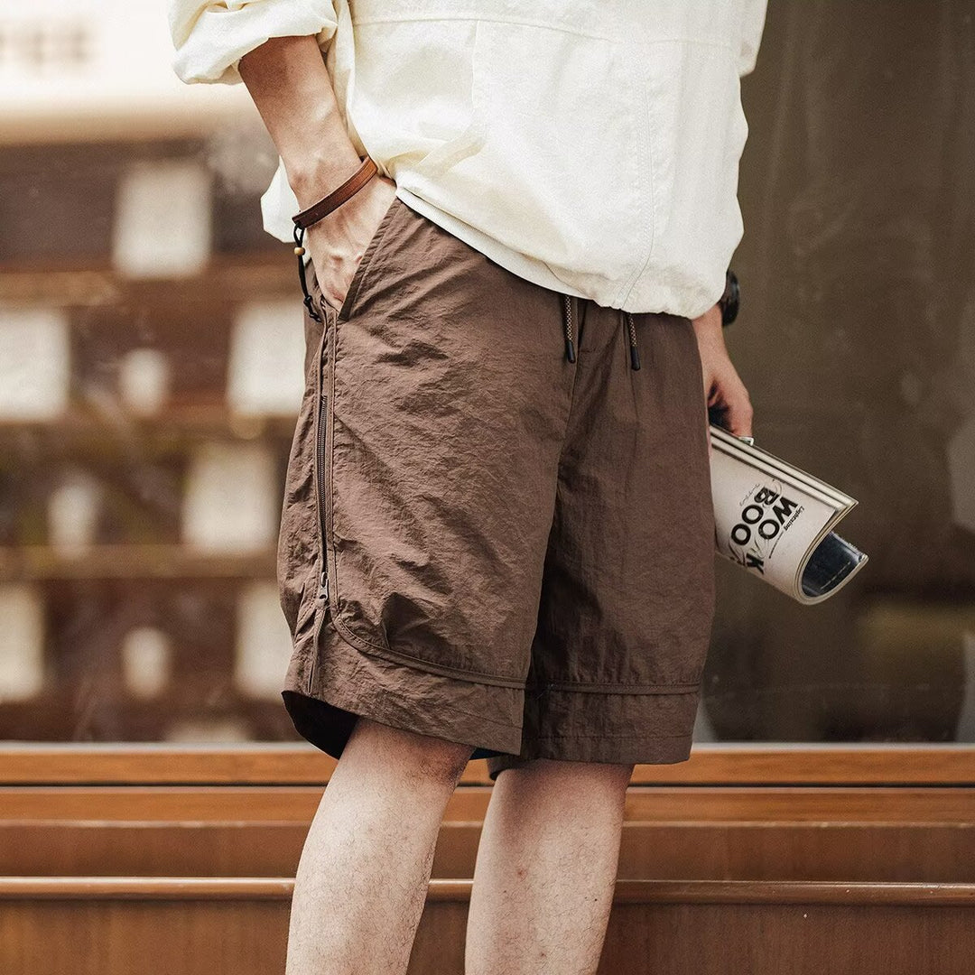 Men's relaxed fit cargo shorts with drawstring waist, knee length, perfect for casual summer wear.