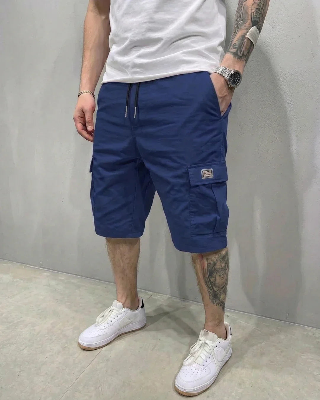 Stylish men's casual cargo shorts with an elastic drawstring waist and spacious flap pockets.
