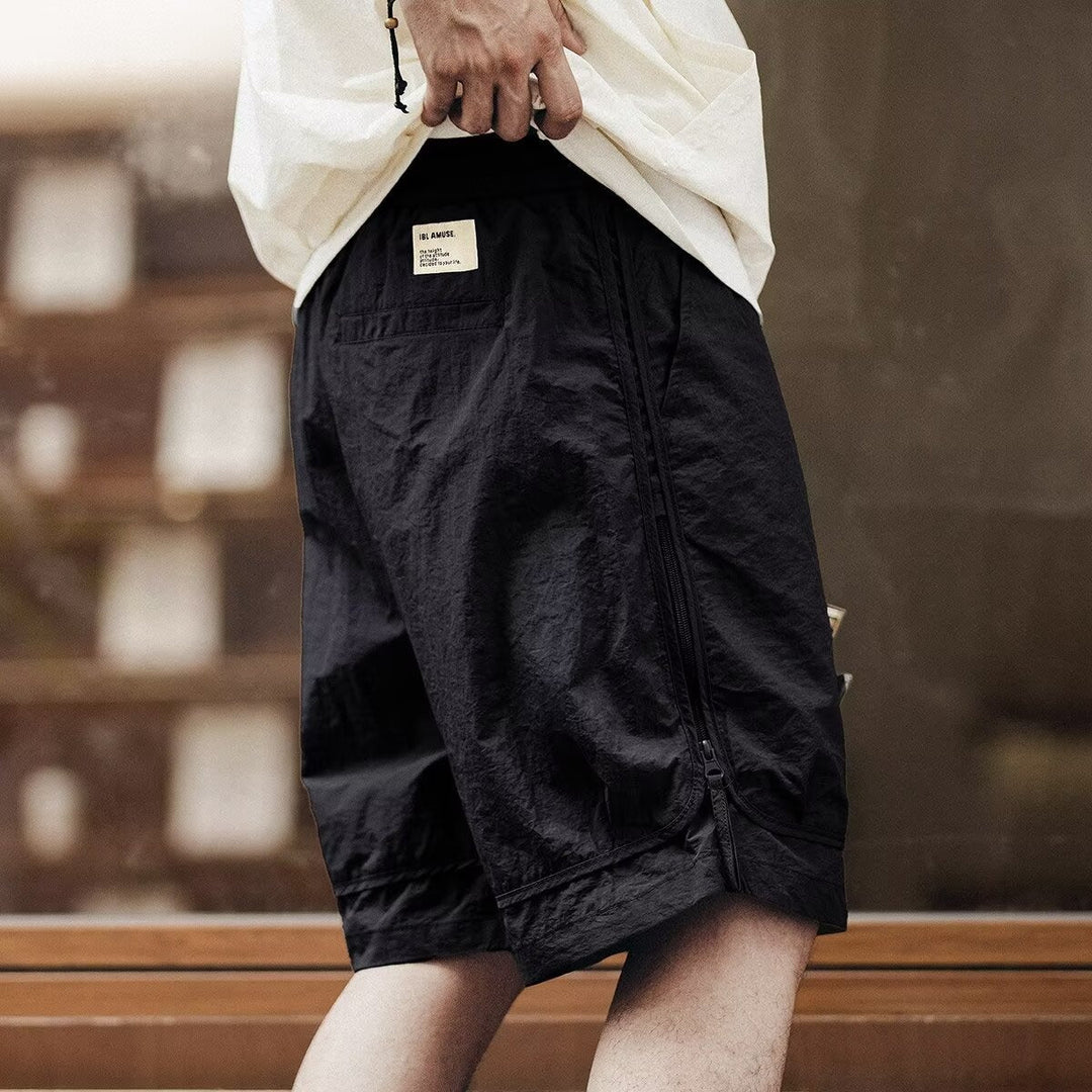 Relaxed men's cargo shorts with elastic drawstring waist, knee-length for comfortable, casual style.
