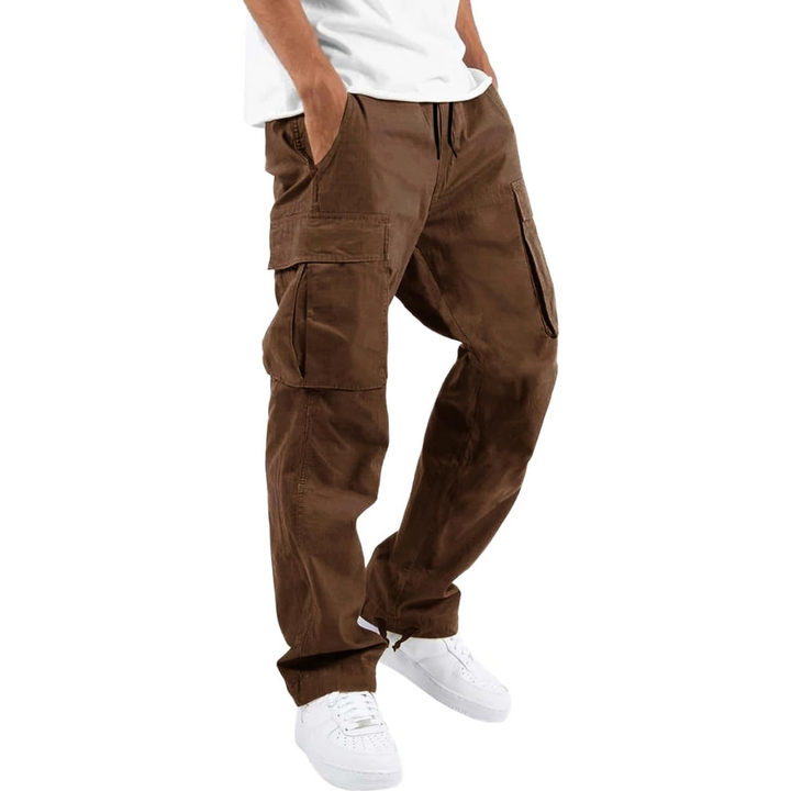 Side profile of men's relaxed fit cargo trousers, highlighting utility pockets, suitable for urban fashion.