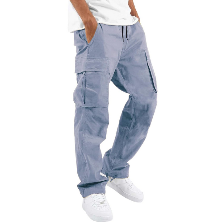 Folded men's relaxed fit cargo trousers, ready for everyday wear, emphasizing comfort & multi-pocket utility.