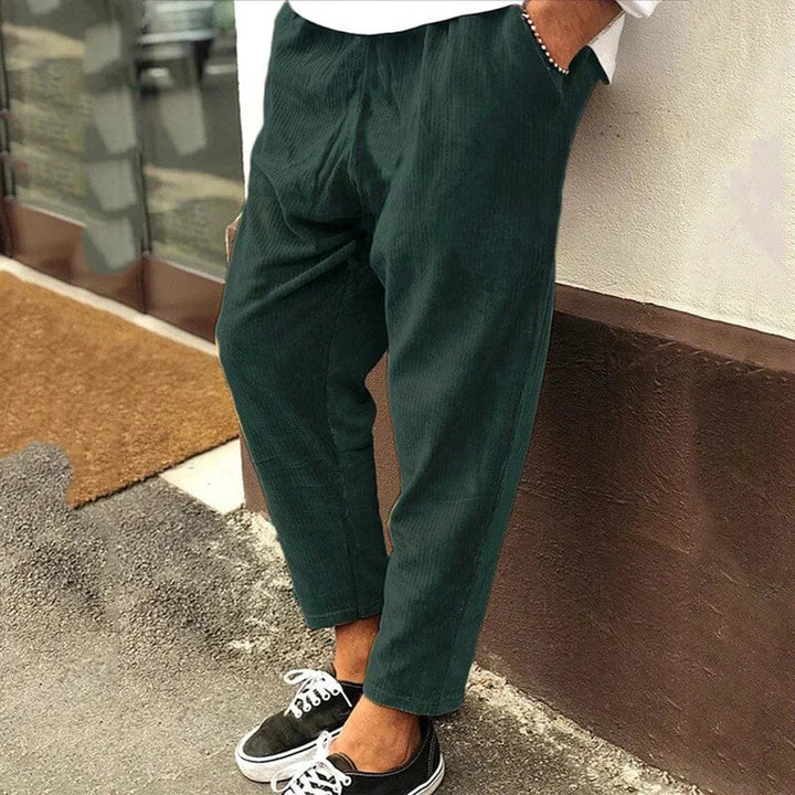 Stylish men's relaxed fit ankle trousers for a modern look, offering comfort for daily casual outfits.