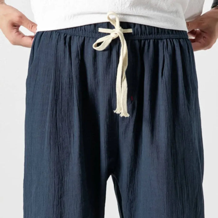 Men's casual straight leg pants, relaxed fit, featuring a comfortable drawstring waist.