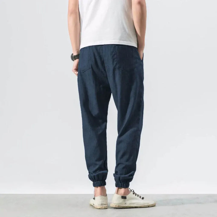Breathable men's pants, lightweight, ideal for a relaxed fit and versatile summer fashion.