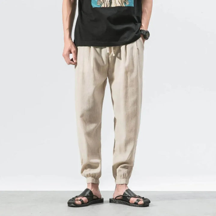 Men's breathable comfort pants, relaxed fit, ideal for everyday wear and summer activities.