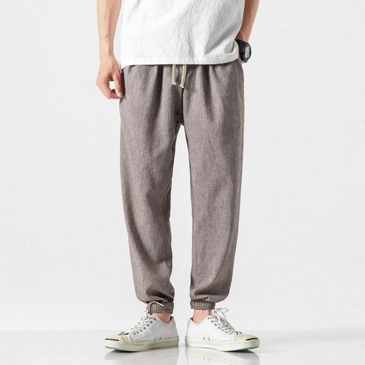 Stylish men's fashion pants, relaxed fit, lightweight material for versatile casual wear.