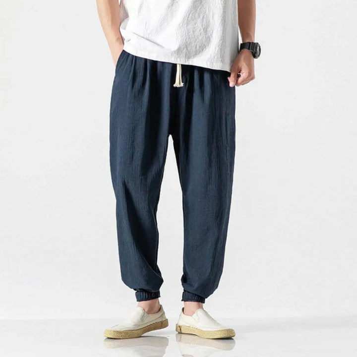 Men's drawstring waist pants, relaxed fit, lightweight and breathable, great for casual outings.