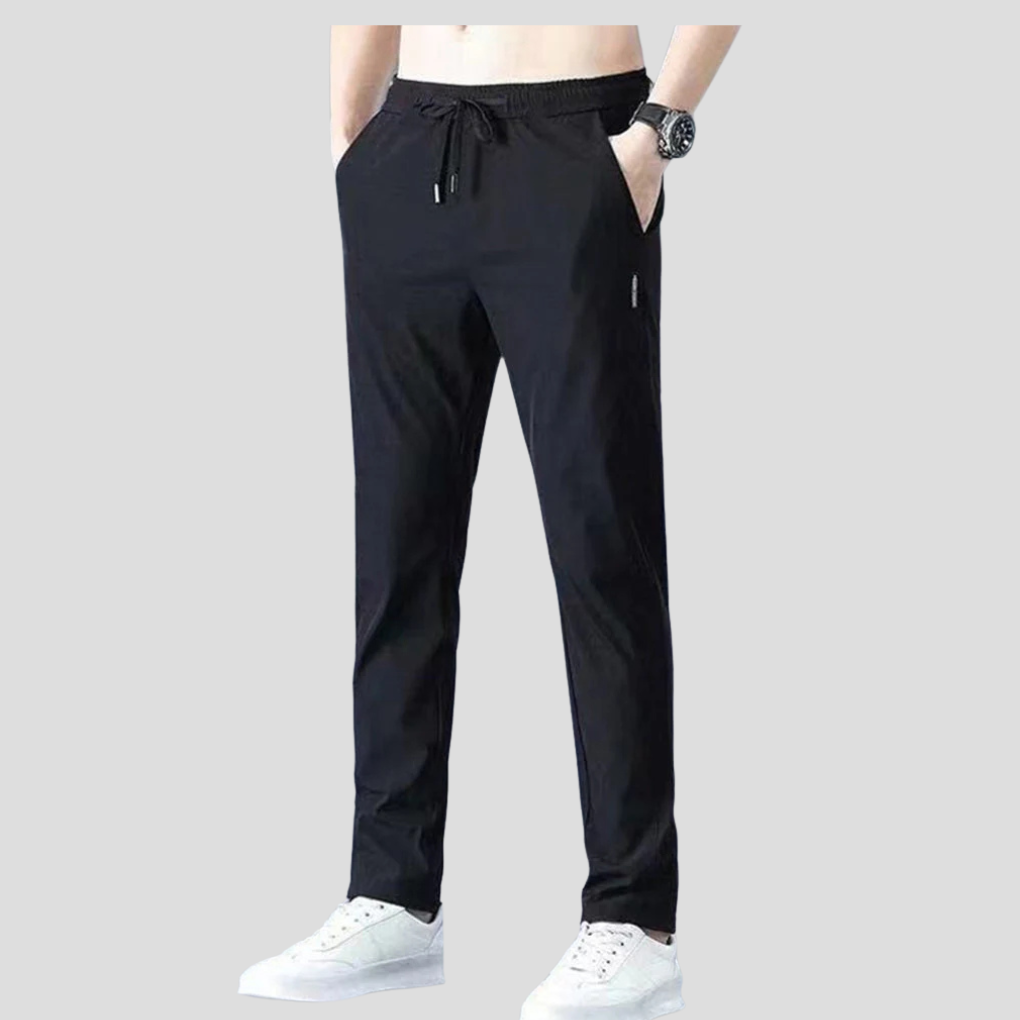 Gray men's straight leg trousers, offering comfortable everyday wear for travel or work.