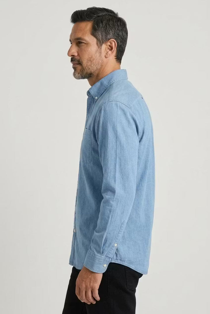 Blue men's relaxed fit chambray shirt, button-up, ideal for everyday comfort.